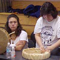 Noreen Milne puts the finishing touches on a hand drum.