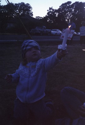 My daughter madison at her first war protest aug 29th 2005[empty string]