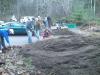 Planting Party, loosening soil to prepare for planting.