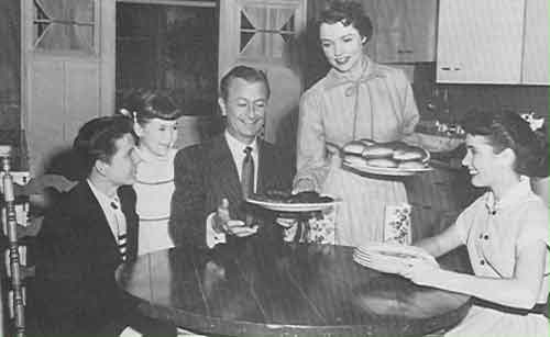 Margaret Anderson serves her family dinner.